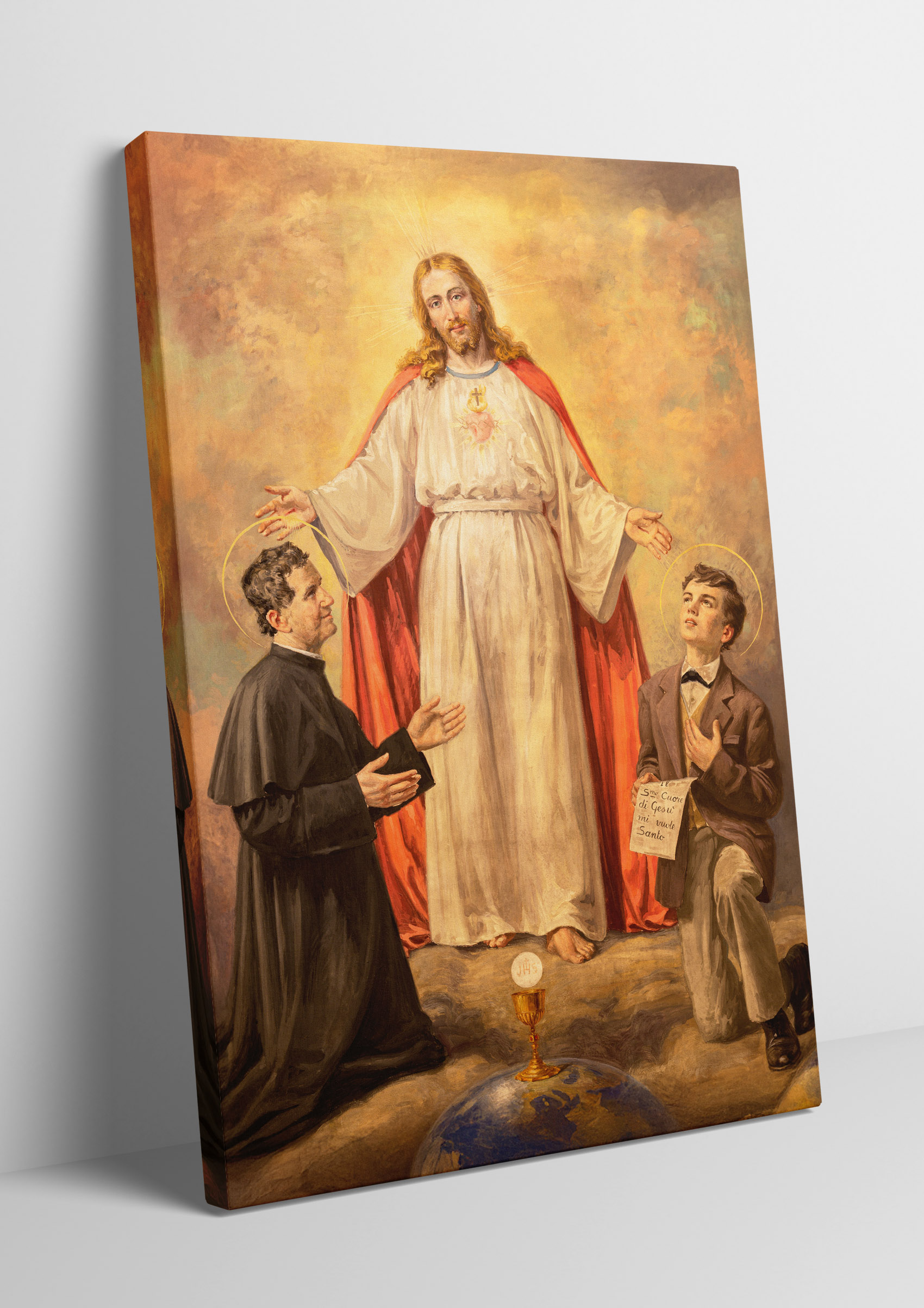 Obraz na płótnie z Jezusem i Świętymi Dominikiem Savio oraz Janem Bosko.