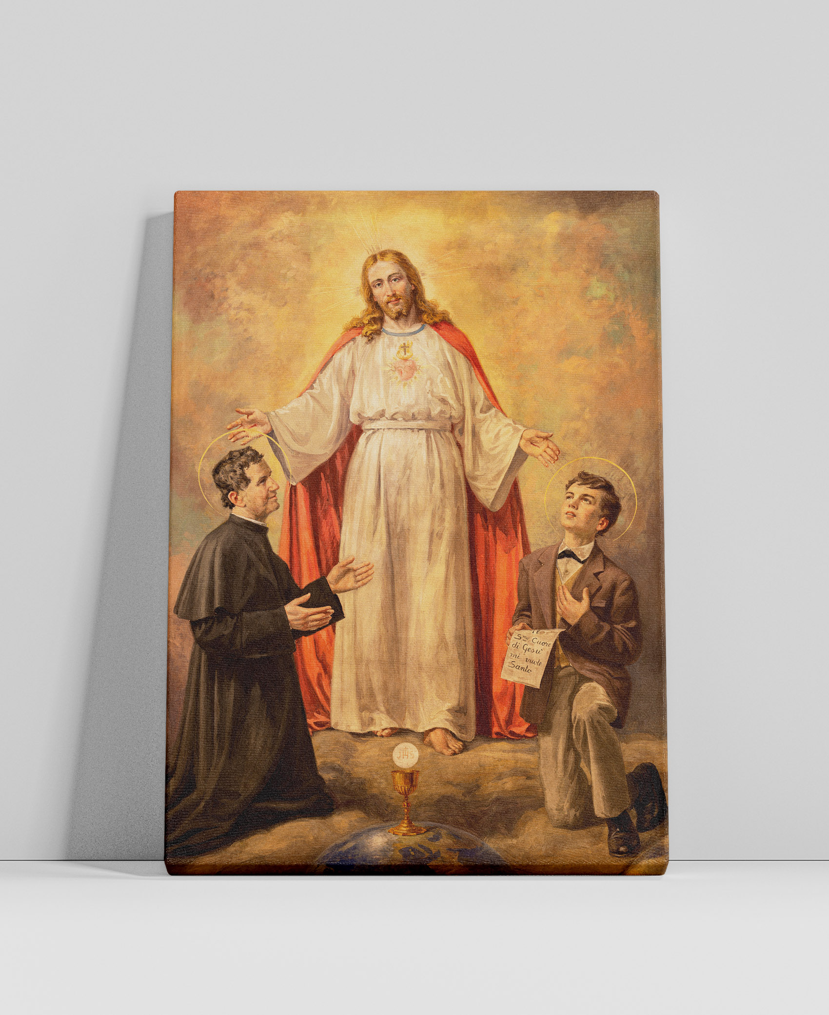 Obraz na płótnie z Jezusem i Świętymi Dominikiem Savio oraz Janem Bosko.